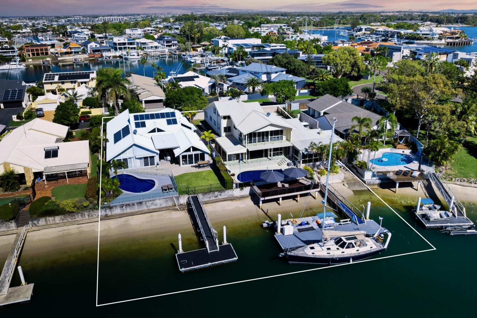 Simon Guilfoyle Markets $13m Dual-Title Minyama Waterfront Holding
